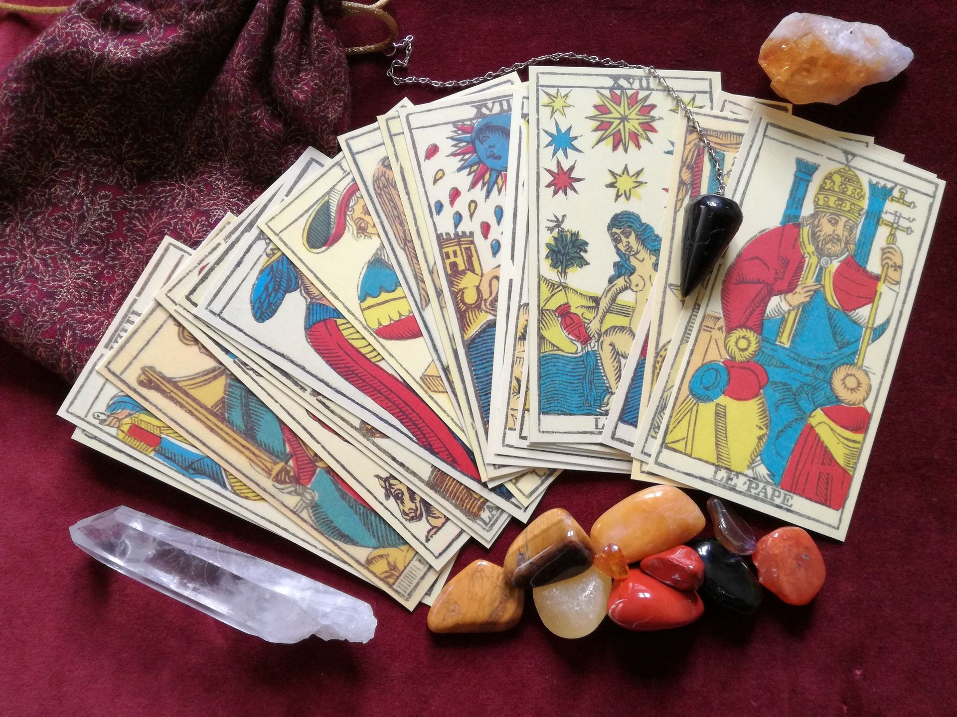 Tarot cards pendulum and healing crystals